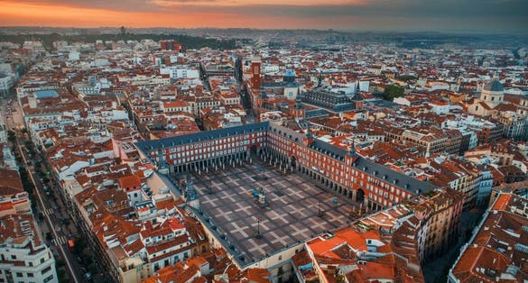 Photo of Madrid plaza Mayor aerial view with historical buildings in Spain.