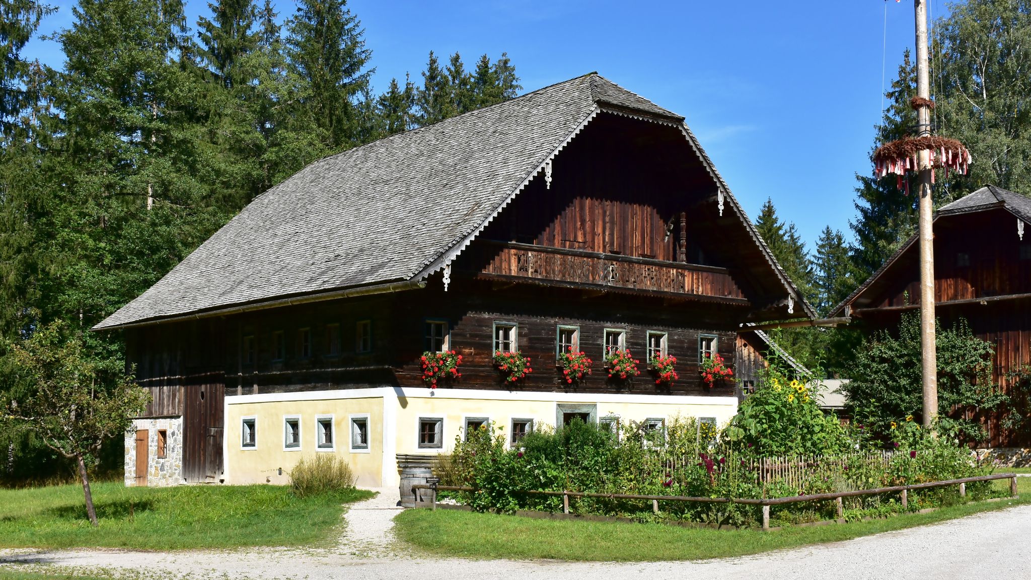 photo of view of historic building of school in open air museum in Gmain near Salzburg in Austria,austria austria.