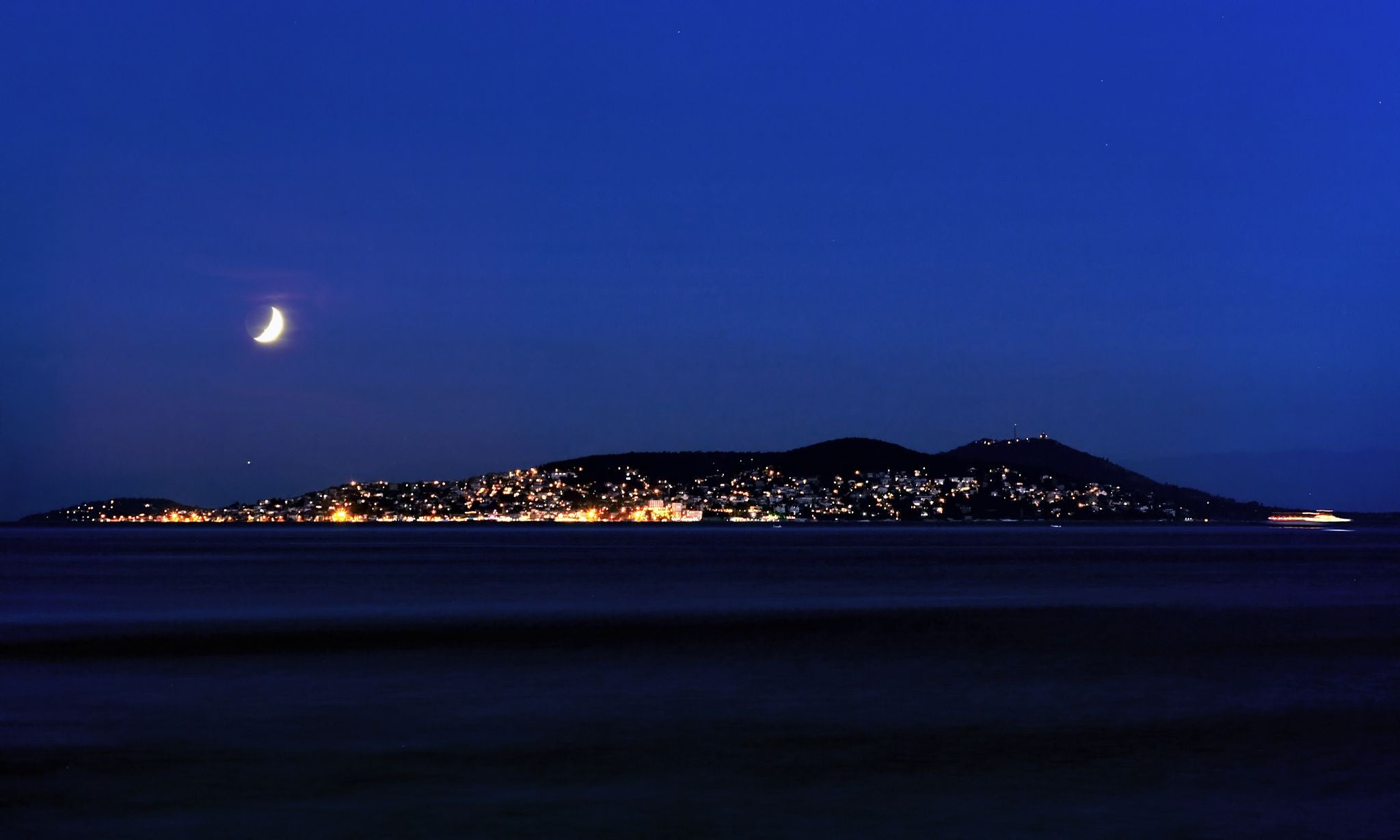 photo of night view of Büyükada in Prince Islands, Istanbul, Turkey.