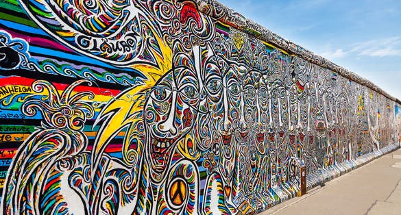 Photo of Berlin Wall graffiti, It's a 1.3 km long part of original Berlin Wall which collapsed in 1989.