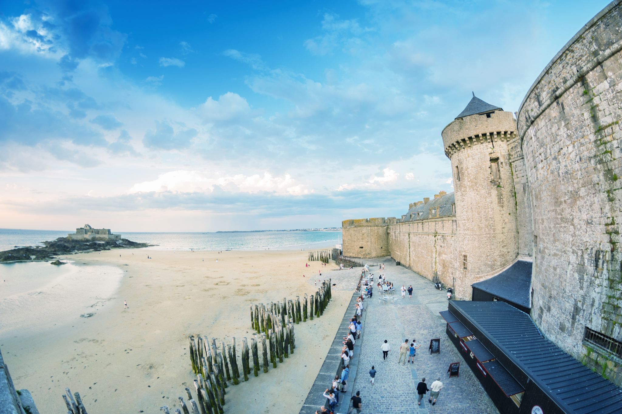 Saint Malo beach and city medieval architecture during Low Tide. 