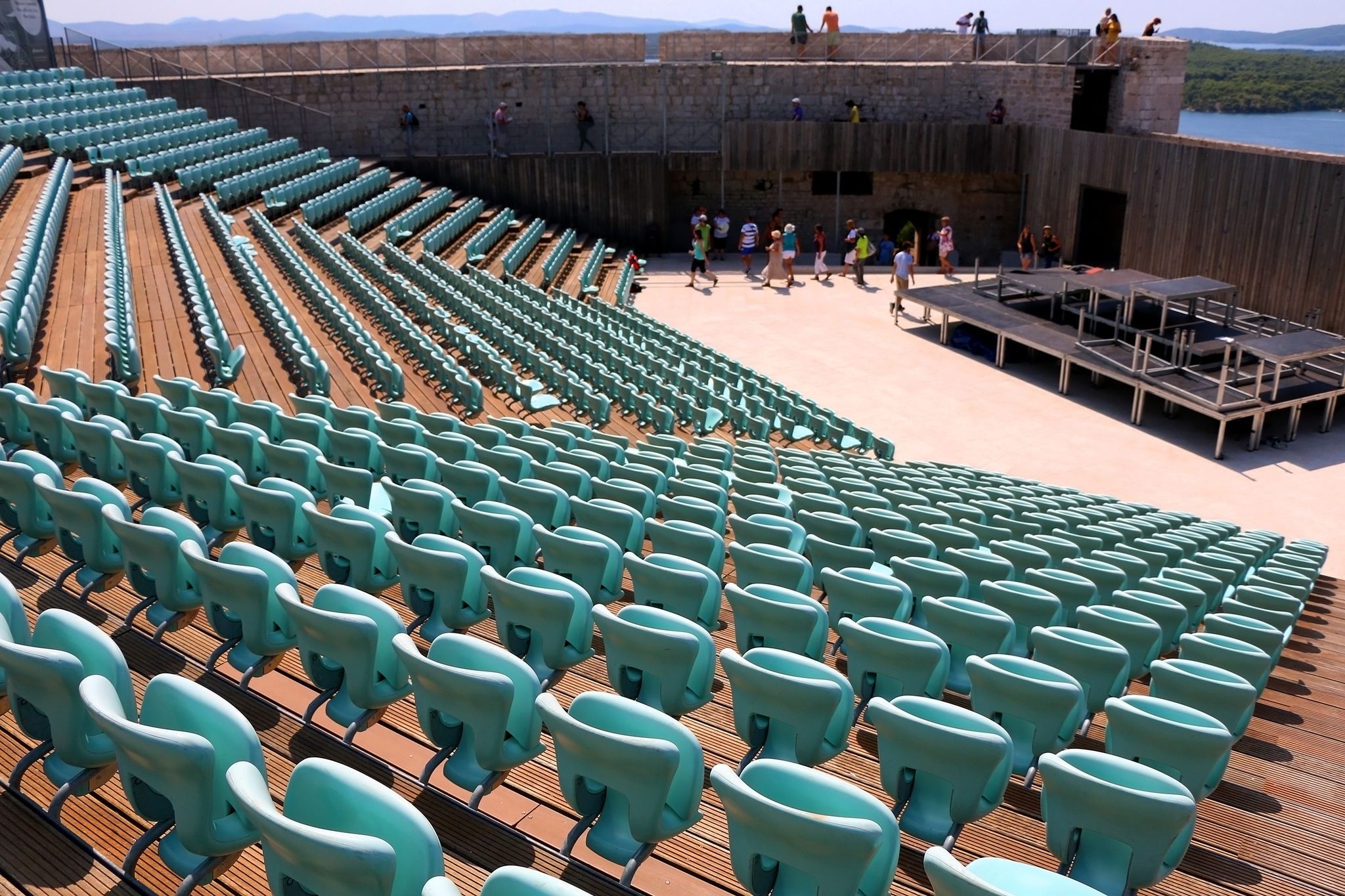 Photo of tourists visiting St. Michael's Fortress, landmark in Sibenik, Croatia.