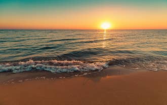 Photo of panoramic aerial view of Kalamis beach and bay in the city of Protaras, Cyprus.