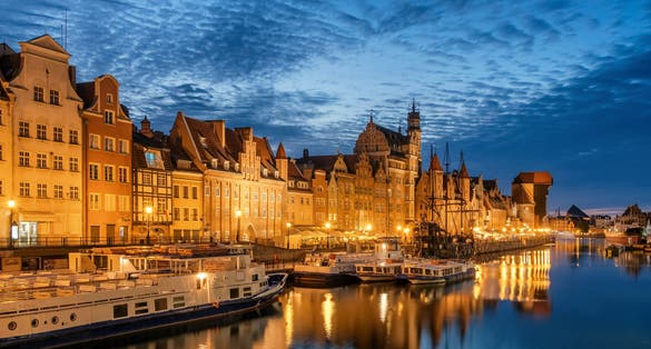 Photo of cityscape of Gdansk old town on the river Motlawa, Poland.