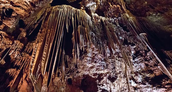 Photo of Stalagmites and stalactites inside the cave of Baradine near the city of Porec in Croatia.
