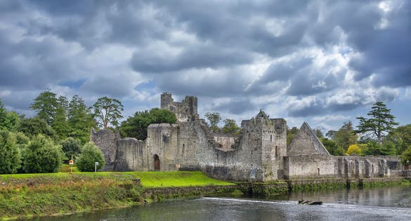 photo of view of Adare Desmond Castle ruins in Adare, County Limerick, Ireland.