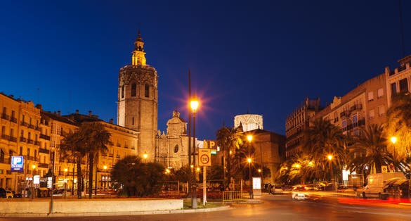 Photo of Valencia, Spain Plaza de la Reina and Micalet tower in central part of city (PlaÃ§a de la Reina) .
