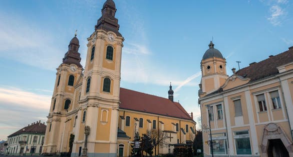 photo of view of Saint Bartholomew Church in Gyongyos, Hungary on a winter day.