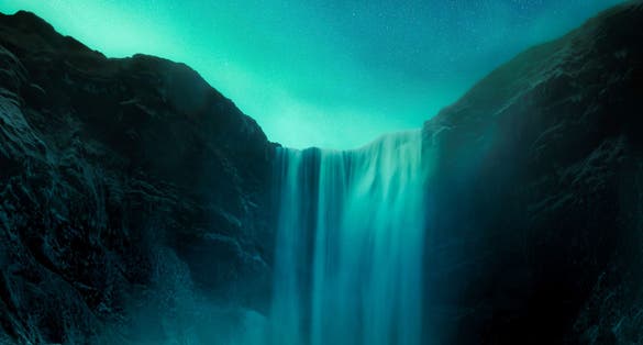 photo of view of kogafoss with northern lights, Höfn, Iceland.