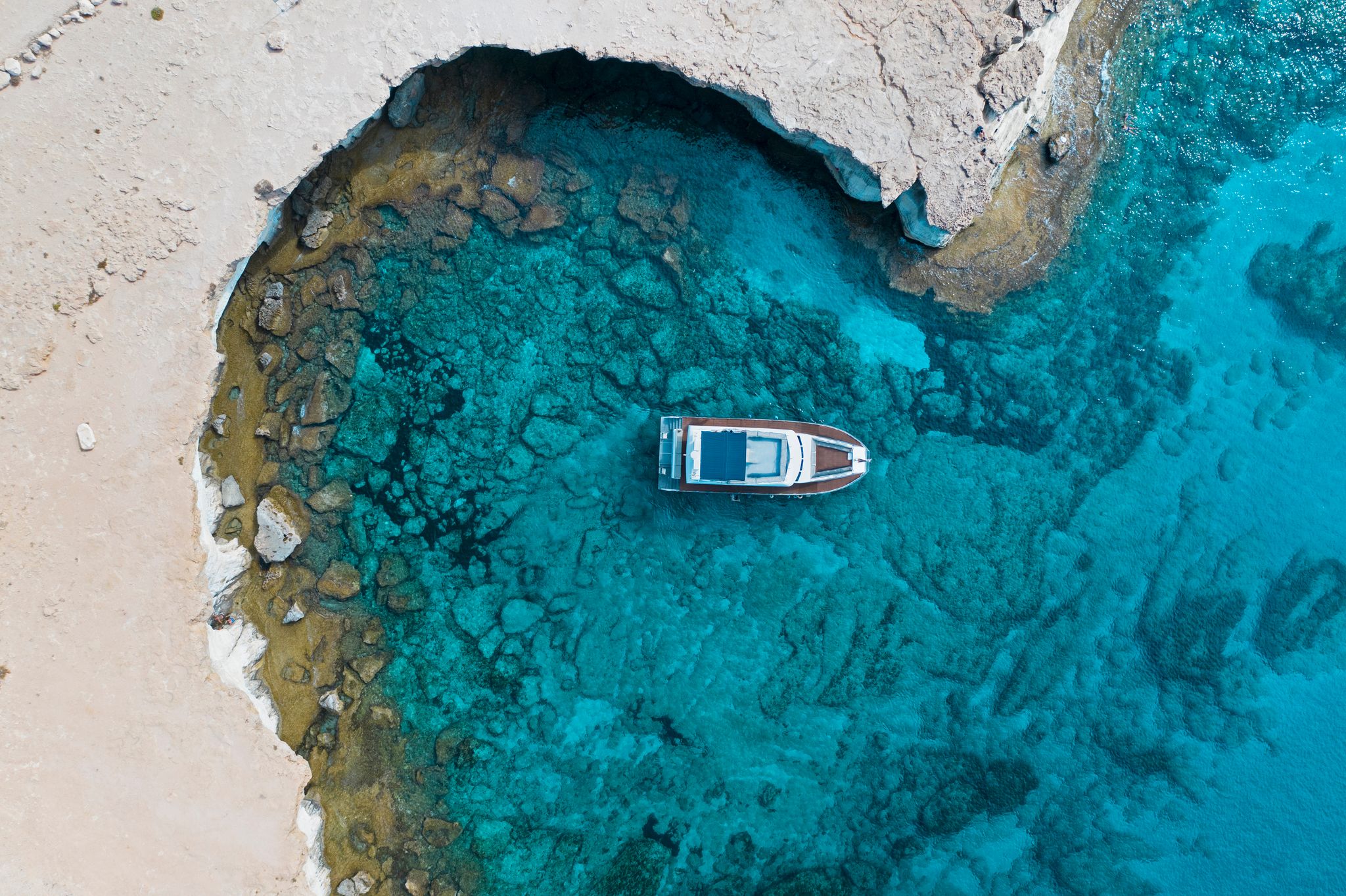 Photo of aerial photography Cape Cavo Greco boat. Mediterranean Sea. Cyprus Ayia Napa Protaras.
