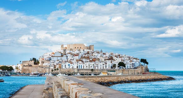 Photo of panorama view of the fortified city of Peniscola in the Costa del Azahar in Castellon.