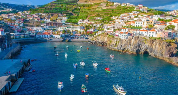 Aerial drone view of Camara de Lobos village, Madeira.