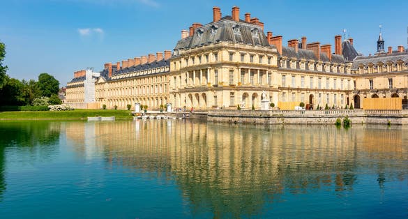 Fontainebleau palace (Chateau de Fontainebleau) and Carp's pond near Paris, France