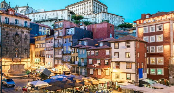 Photo of Illuminated historic Ribeira Square in downtown of famous Porto, Portugal.