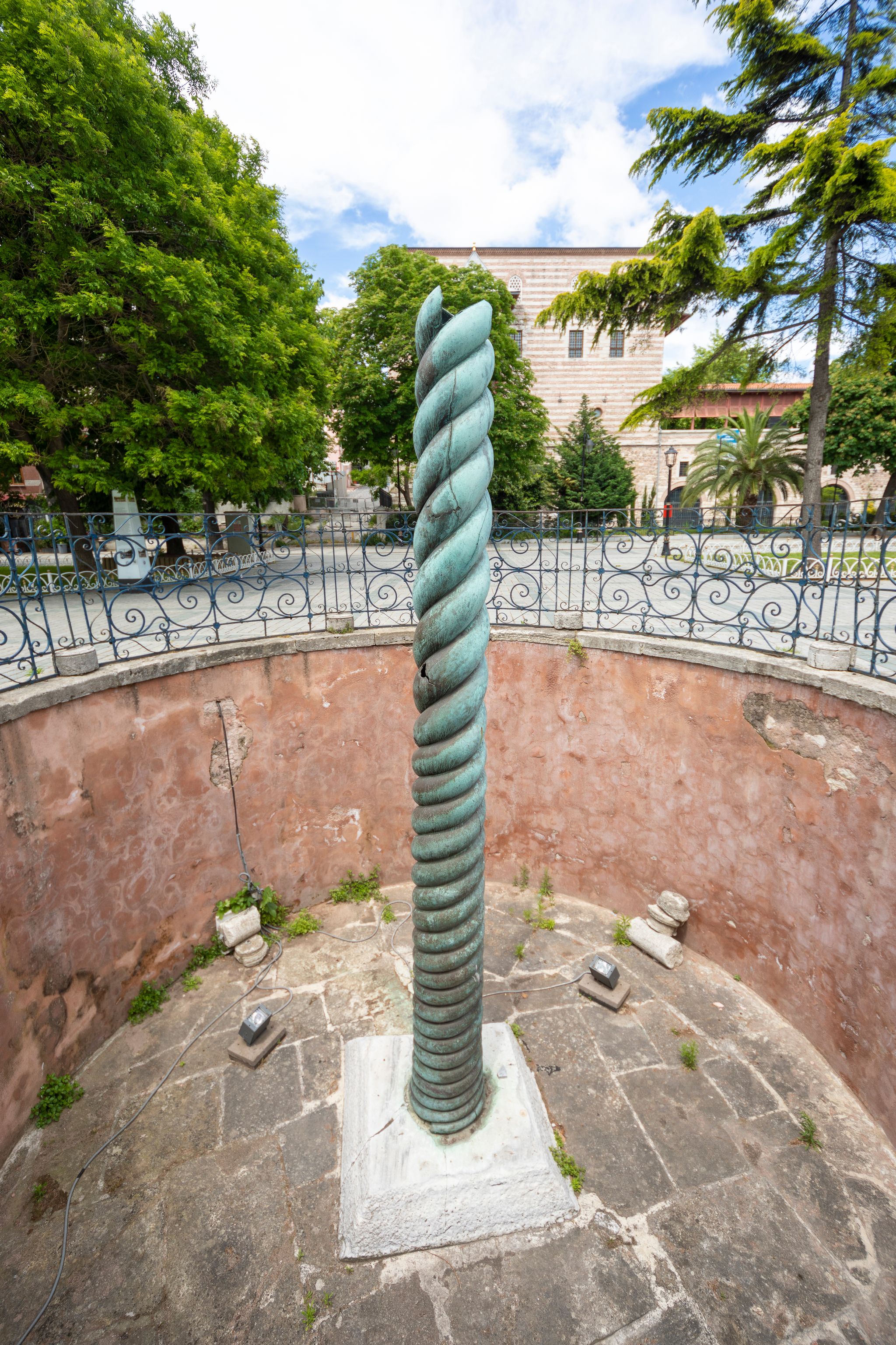 photo of The Greek Serpent Column from above also known as the Serpentine Column, Delphi Tripod or Plataean Tripod is an ancient bronze column at the Hippodrome of Constantinople, Istanbul, Turkey.