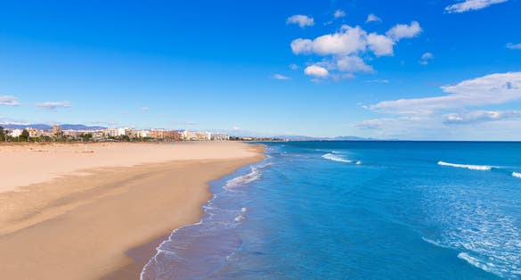 Photo of Sagunto beautiful beach in Valencia on a sunny day in Mediterranean Spain.