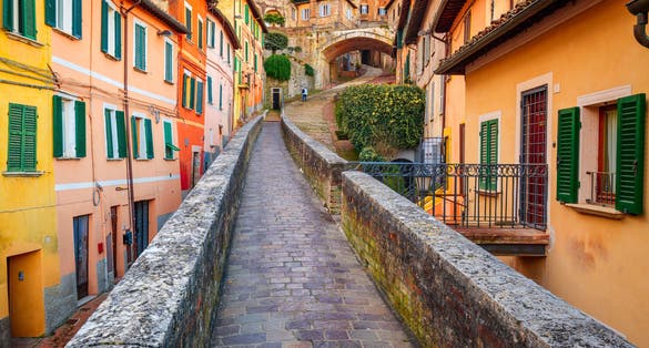 photo  of view  of Perugia, Italy on the medieval Aqueduct Street in the morning.