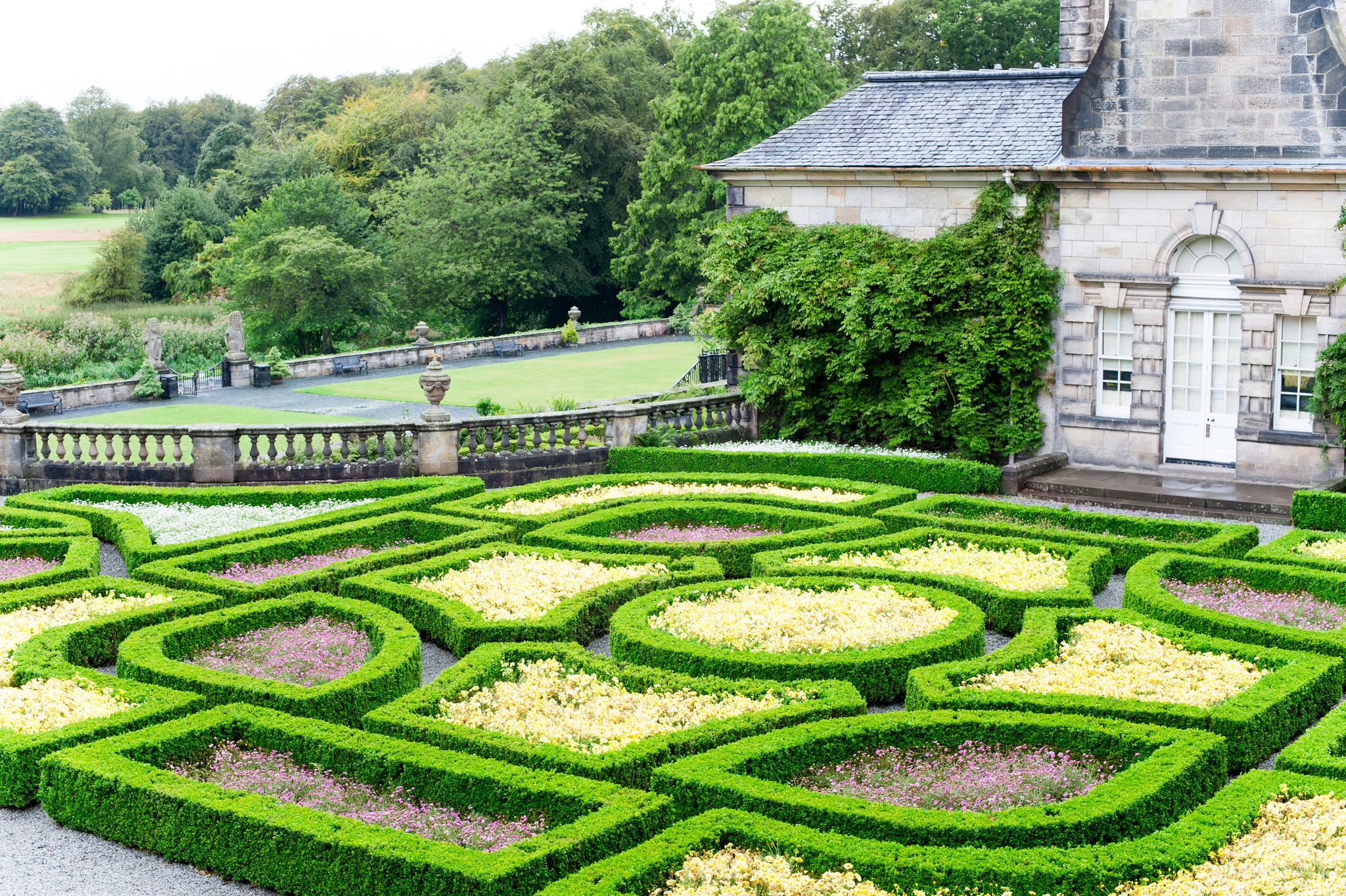 Photo of Pollok Country park ornamental formal garden. Glasgow, Scotland, UK. Outdoors colored summertime horizontal image.