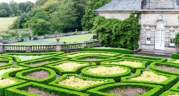 Photo of Pollok Country park ornamental formal garden. Glasgow, Scotland, UK. Outdoors colored summertime horizontal image.