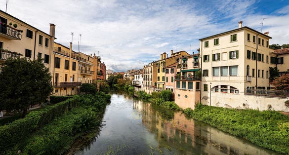 The River Bacchiglione in the Padua city view from the Ponte Molino (mill bridge). Veneto, Italy, Europe.