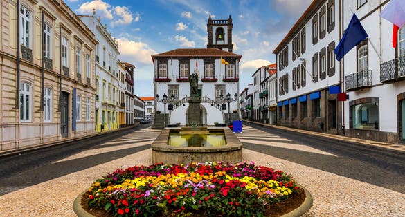 Photo of Ponta Delgada City Hall with a bell tower in the capital of the Azores, Portugal.