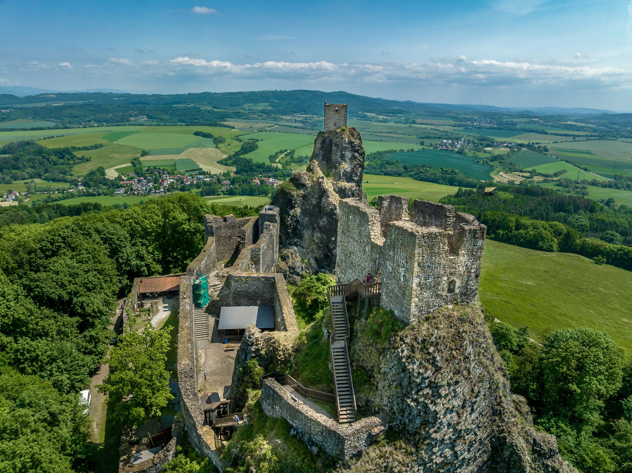 Photo of aerial view of two tower medieval stronghold Trosky state castle in the Czech paradise.