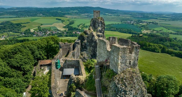 Photo of aerial view of two tower medieval stronghold Trosky state castle in the Czech paradise.