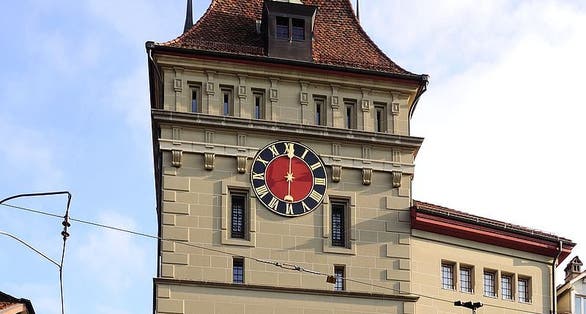 photo of the famous medieval tower called the Kafigturm in Bern, Switzerland and part of the UNESCO Cultural World Heritage Site of the Old City of Bern.