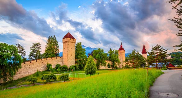 photo of Museggmauer it's an old city wall and towers in Luzern, Switzerland.