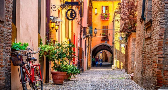 Cozy narrow street in Ferrara, Emilia-Romagna, Italy. Ferrara is capital of the Province of Ferrara