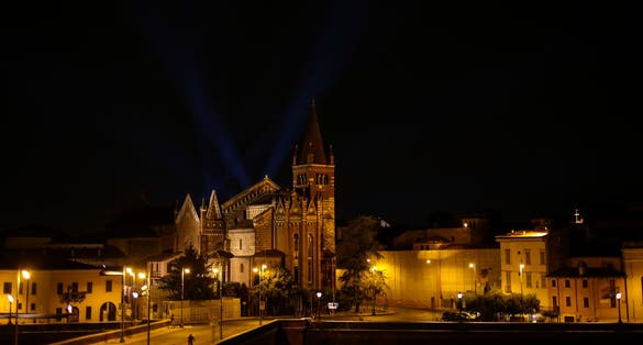 PHOTO OF ITALY, PROVINCE VERONA, VERONA: San Fermo Maggiore church by night. Built in Romanesque and Gothic style in central Verona view from the Ponte delle Navi bridge over the Adige river in Verona.
