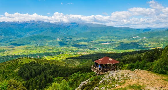 Photo of aerial view of a mountainous landscape in Macedonia view from the top of Vodno mountain near Skopje.