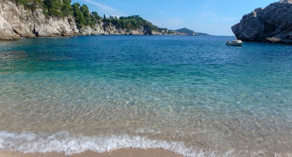 Photo of stunning Blue Turquoise Water of Bellevue Beach, Dubrovnik, Croatia.