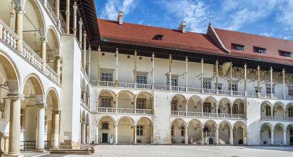 Photo of the tiered arcades of Sigismund I the Old in the Italian Renaissance courtyard within Wawel Castle, Krakow, Poland.