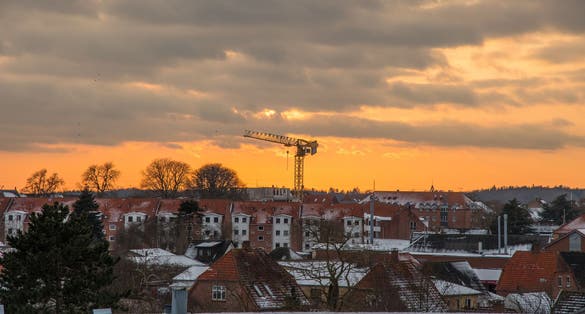 photo of view of Sunset above town of Vordingborg in Denmark on a winter day, Vordingborg, Denmark.