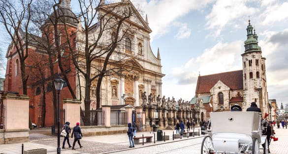 Beautiful Krakow. Saints Peter and Paul Church (to the left) and St. Andrew's Church (to the right) in the evening.