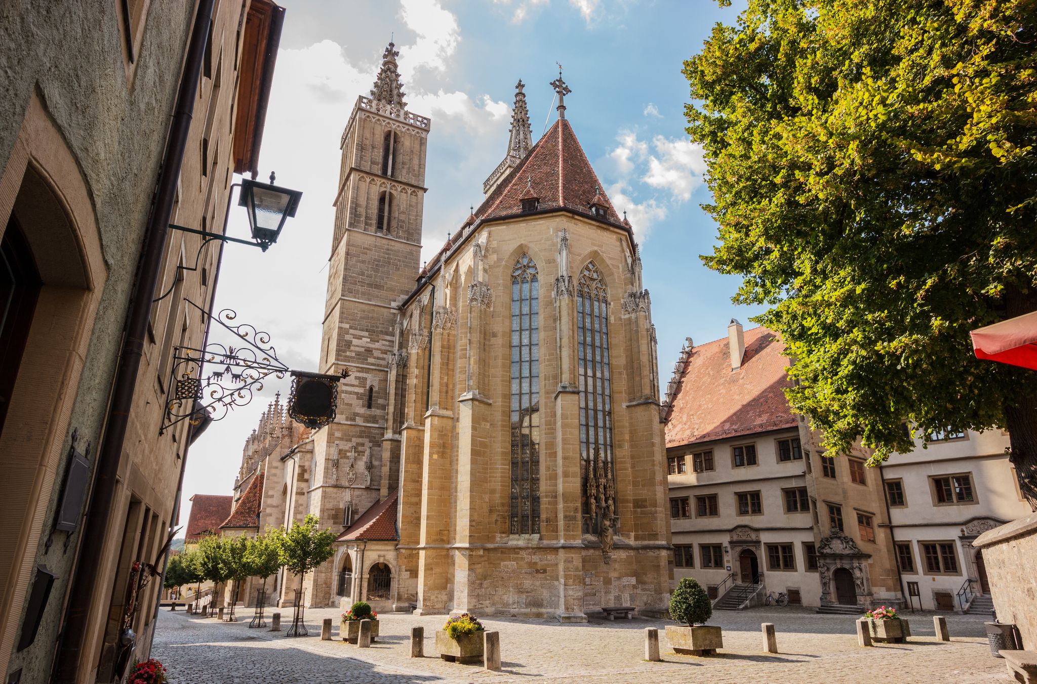 Beautiful postcard day view of St. Jakob or St. James Church or St. Jakob Kirche, Rothenburg ob der Tauber, Germany. one of the favorite's attraction of Germany's Romantic Road driving destination.