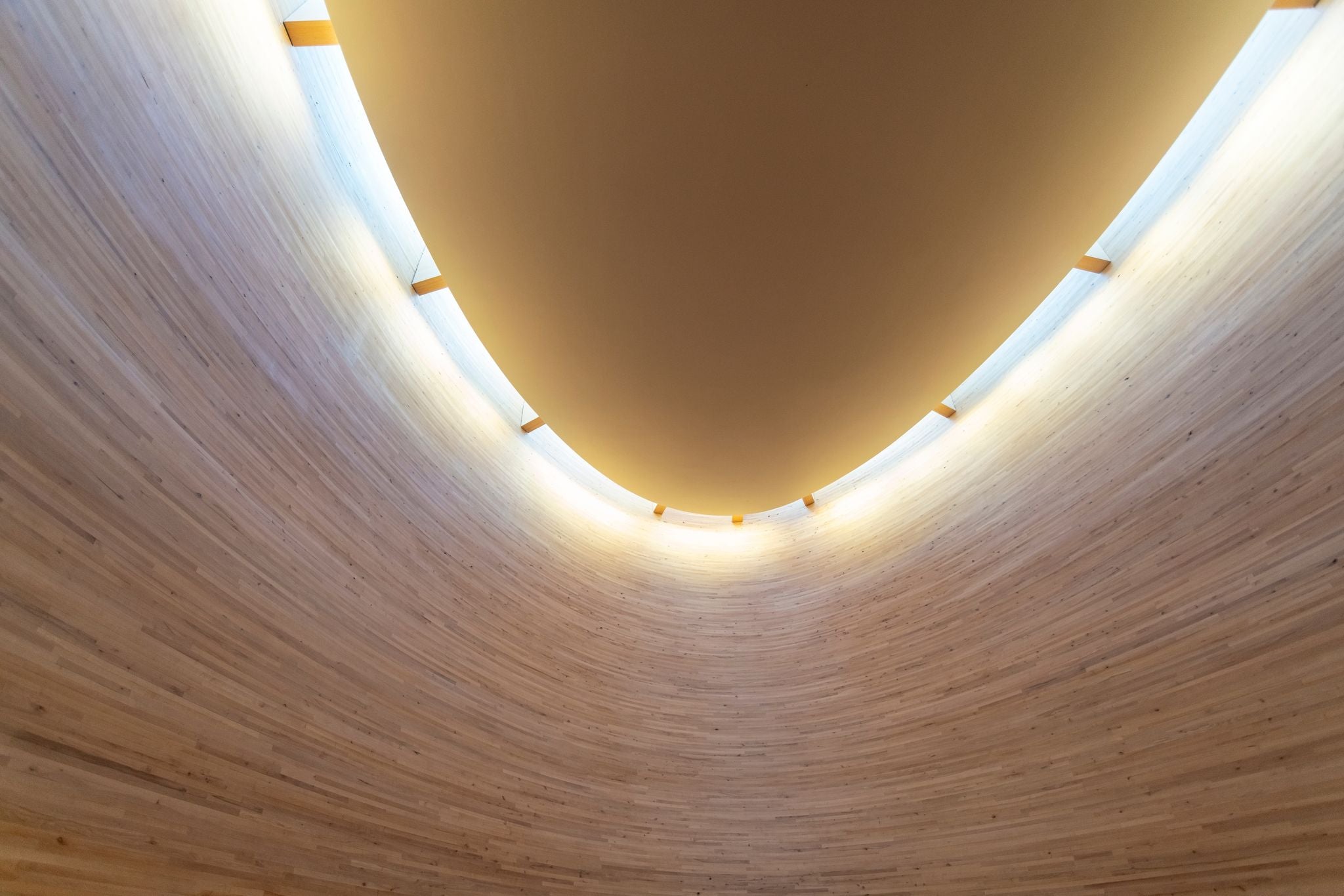 Photo of the interior of Kamppi wooden Chapel at Narinkka Square in Helsinki, Finland.