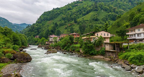 Photo of Camlihemsin center view with Firtina Stream in Rize, Turkey. 