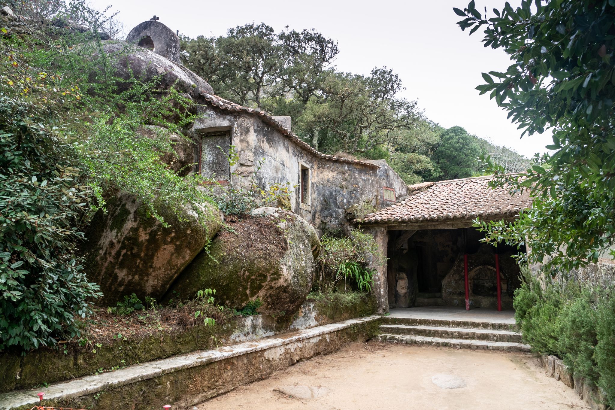 Photo of Abandoned and empty medieval Convento dos Capuchos in the Serra de Sintra National Park,Portugal. Portugal and Sintra travel destinations.