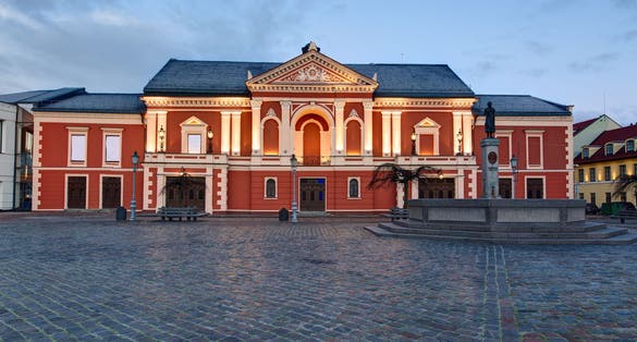 Illuminated facade of the Theater House. Theatre square, Klaipeda. Lithuania