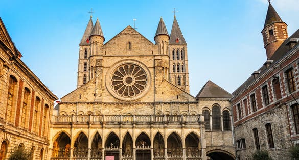 Photo of Notre-Dame de Tournai facade view with towers , Cathedral of Our Lady, Tournai, Walloon municipality, Belgium.