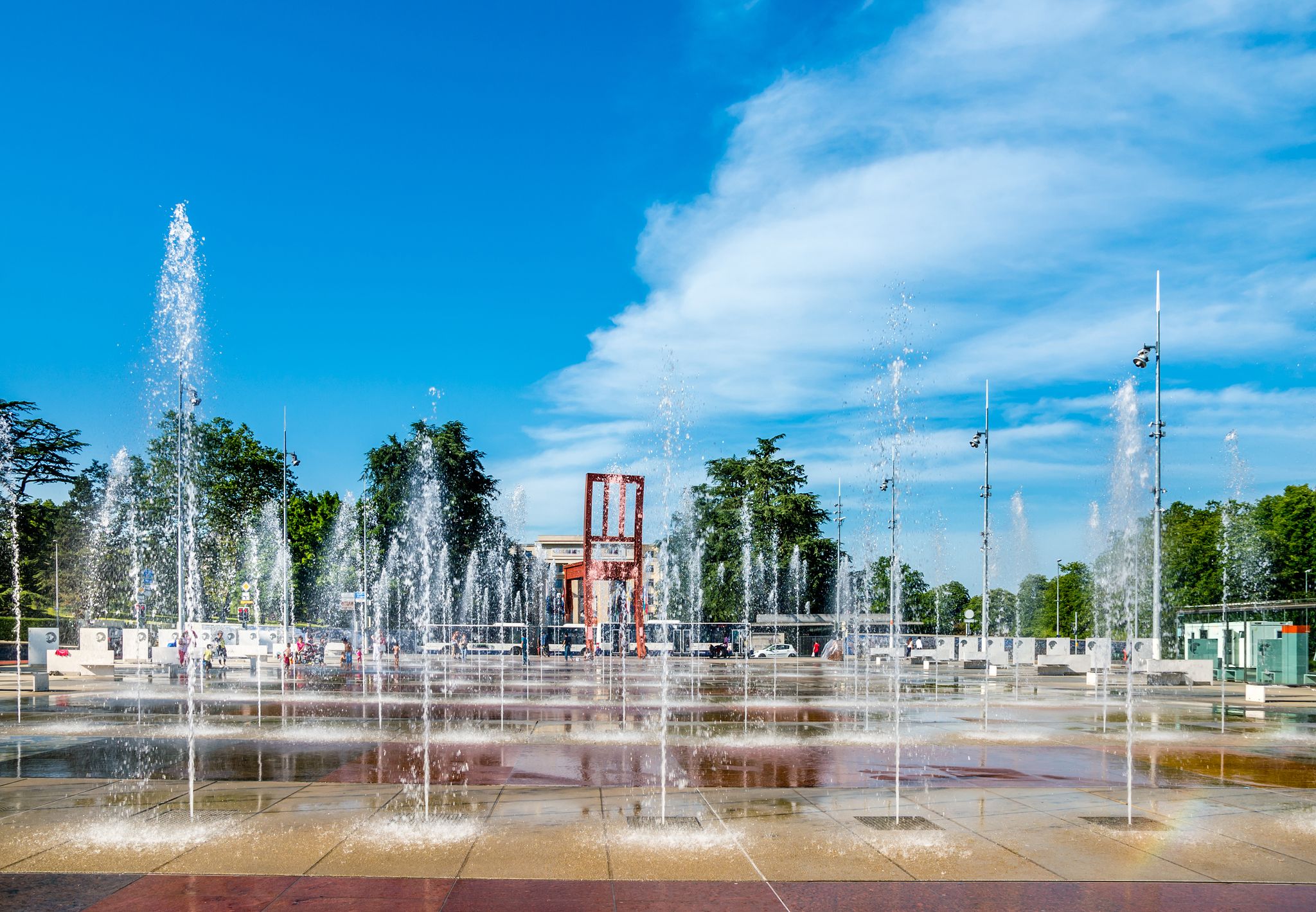 photo of fountains at Square of Nations before Palace of Nations in Geneva, Switzerland.