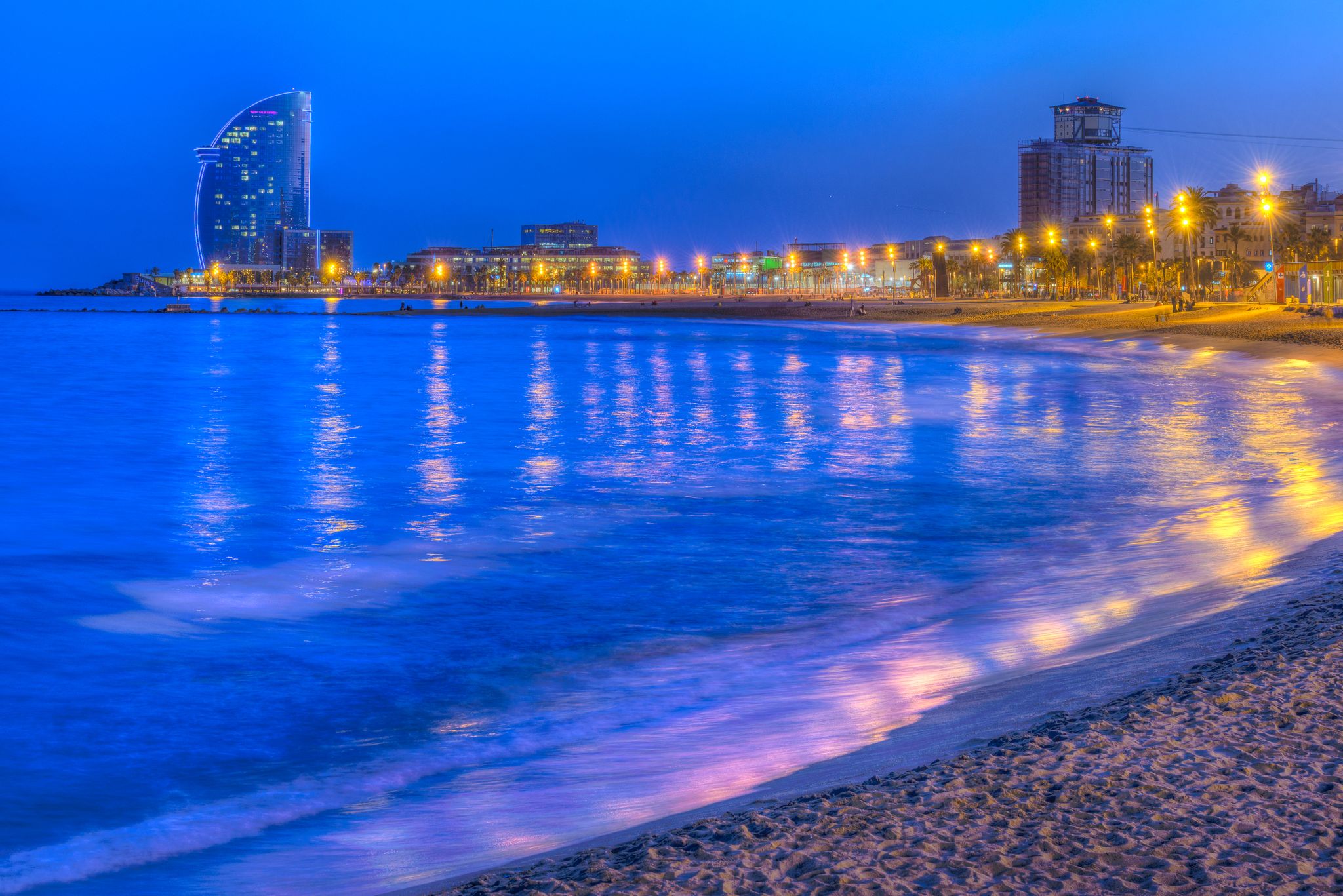 Photo of Serene, beautiful evening on La Barceloneta beach Barcelona Catalonia Spain.