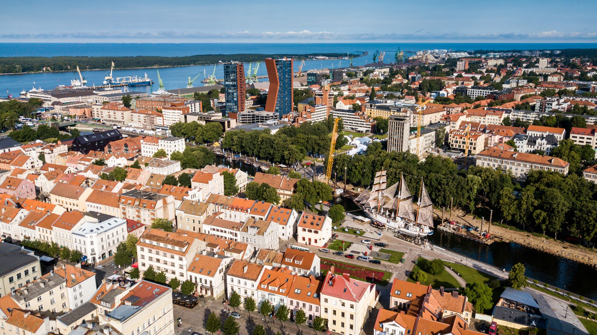 Aerial view of Klaipeda city old town, located on the shore of Baltic sea during summer day.