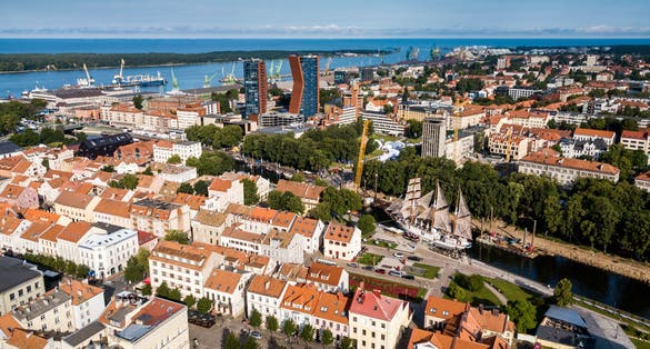 Aerial view of Klaipeda city old town, located on the shore of Baltic sea during summer day.