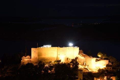 Photo of Saint Michaels Fortress at night in Sibenik, Croatia.