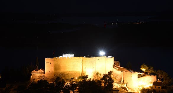 Photo of Saint Michaels Fortress at night in Sibenik, Croatia.