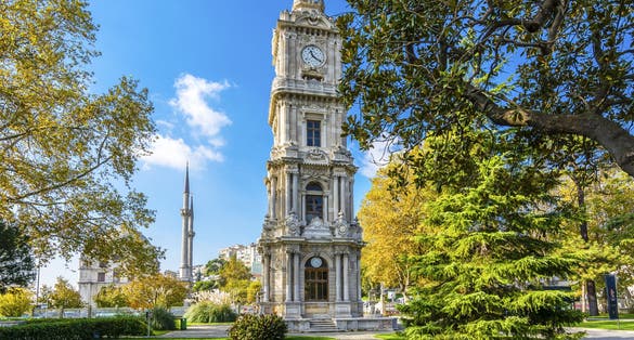 photo of Dolmabahçe Clock Tower in beautiful morning in Beşiktaş, Istanbul, Turkey.