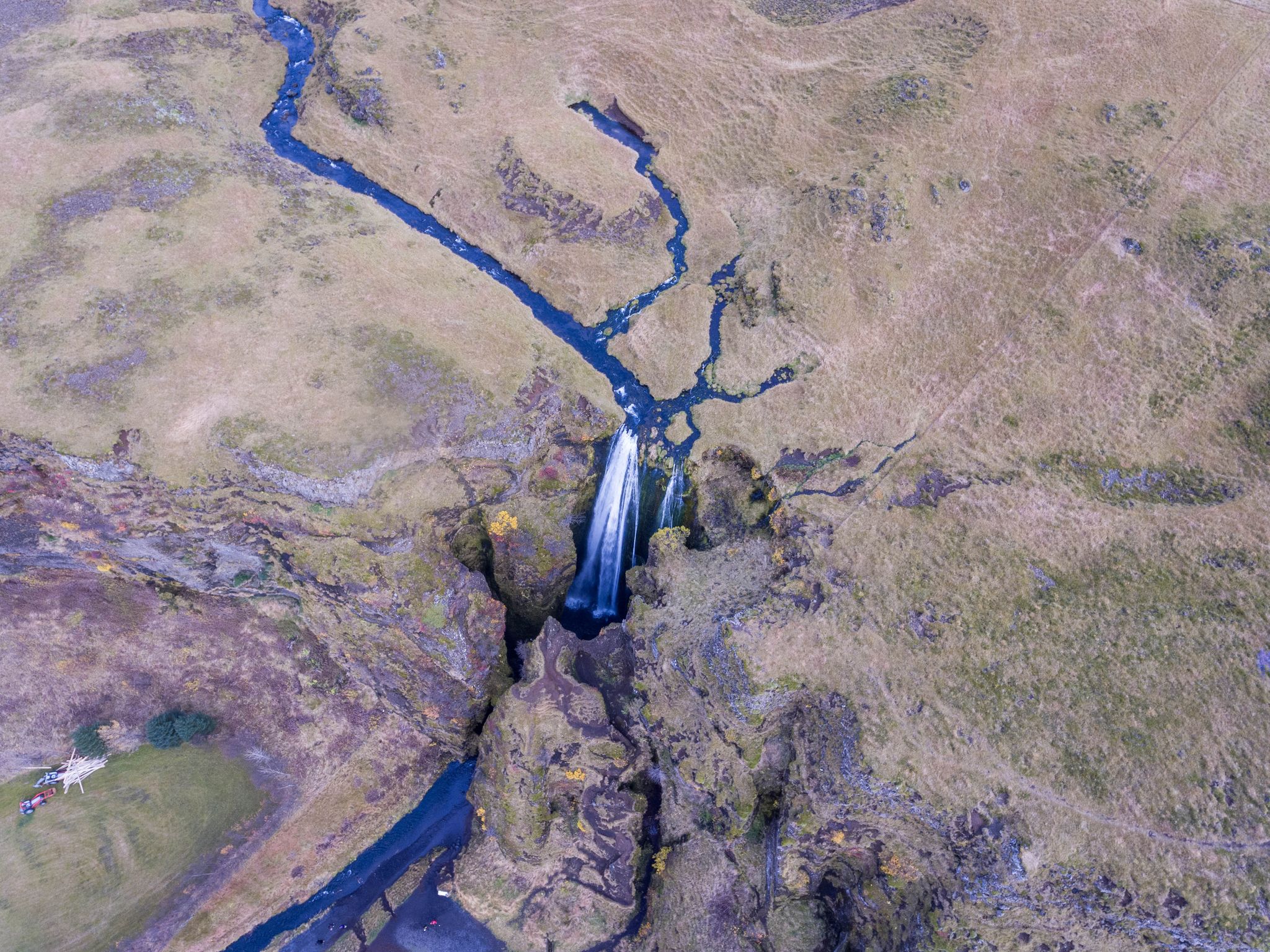 photo of aerial view of gljúfrabúi waterfall in hvolsvöllur, Iceland.